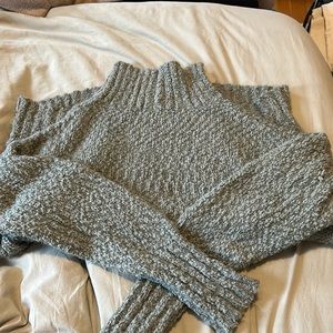 Green mock turtleneck sweater